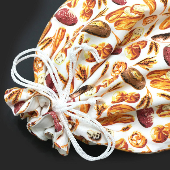 Kenyeres zsák. Benne sokáig friss marad a péktermék. PUL bélés, mosható, zero waste. Kenyér mintás