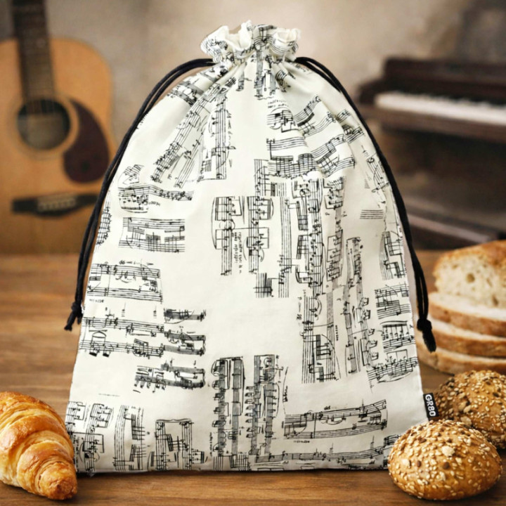 Kenyeres zsák. Benne sokáig friss marad a péktermék. PUL bélés, mosható, zero waste. Kotta mintás